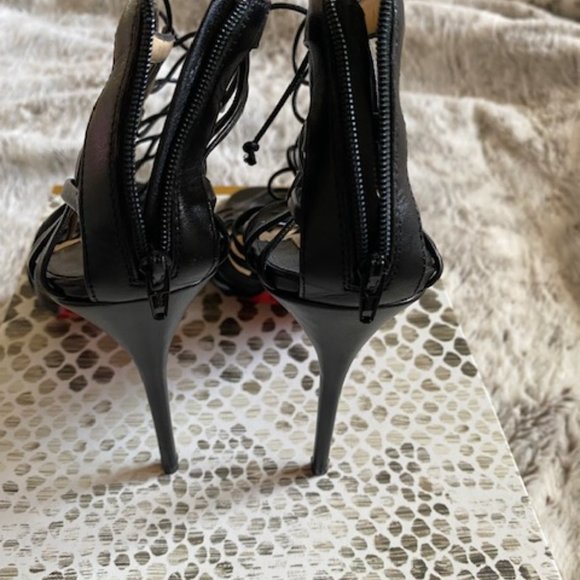 Christian Louboutin - Picture 3 of 6